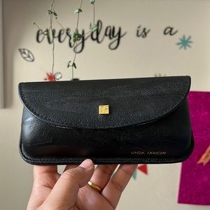 Linda Farrow Glass case